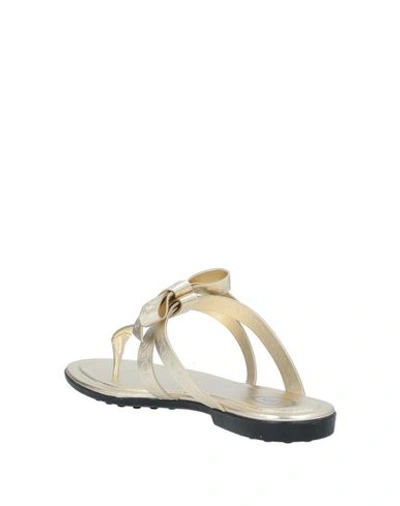 Shop Tod's Toe Strap Sandals In Gold