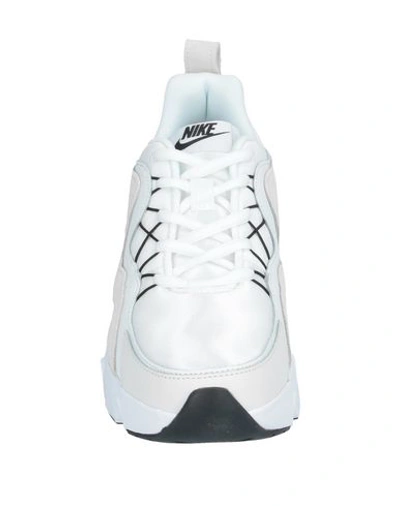 Shop Nike Sneakers In White