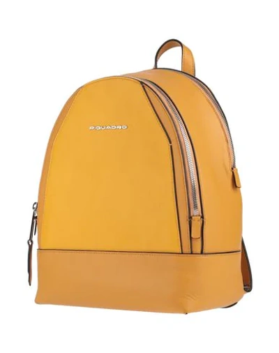 Shop Piquadro Backpacks In Ocher