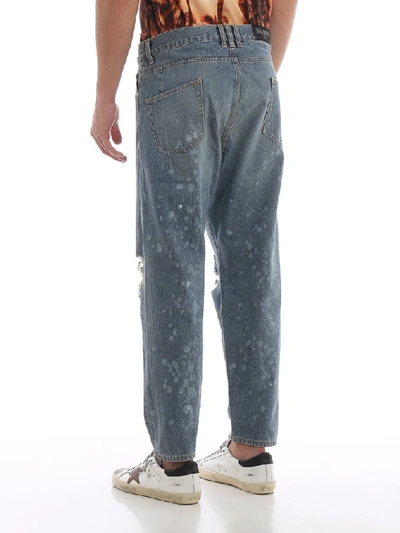 Shop Balmain Distressed Jeans In Blue