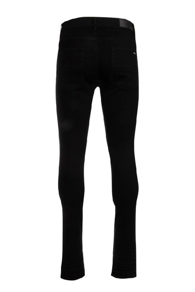 Shop Amiri Trasher Classic Jeans In Black