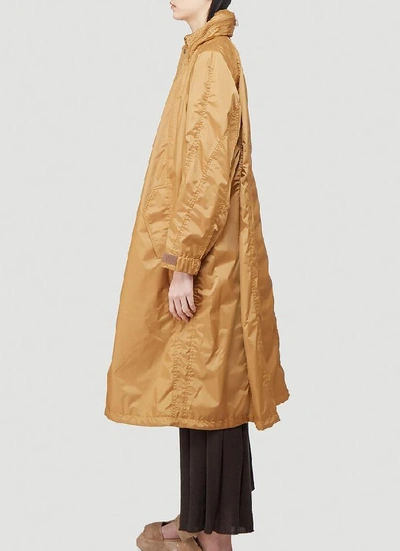 Shop Issey Miyake Hooded Raincoat In Brown