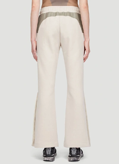 Shop Adidas By Stella Mccartney Flared Track Pants In Beige