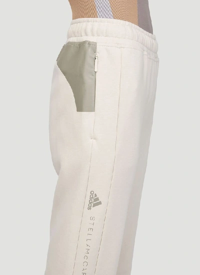 Shop Adidas By Stella Mccartney Flared Track Pants In Beige