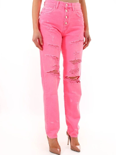 Shop Amiri Ripped Jeans In Pink