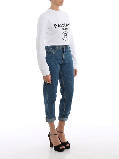 Shop Balmain Logo Cropped Sweatshirt In White