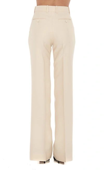 Shop Gucci High Waisted Flare Pants In Beige