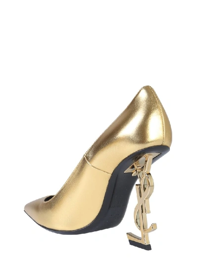 Shop Saint Laurent Opyum Monogram Pumps In Gold