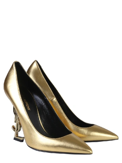 Shop Saint Laurent Opyum Monogram Pumps In Gold