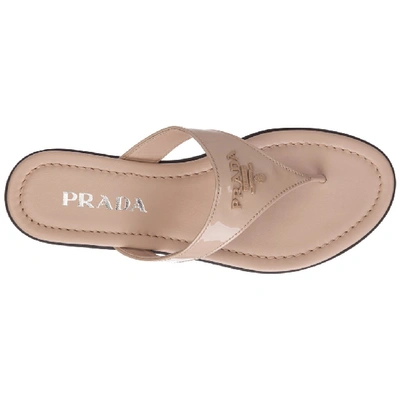Shop Prada Logo Thong Sandals In Beige