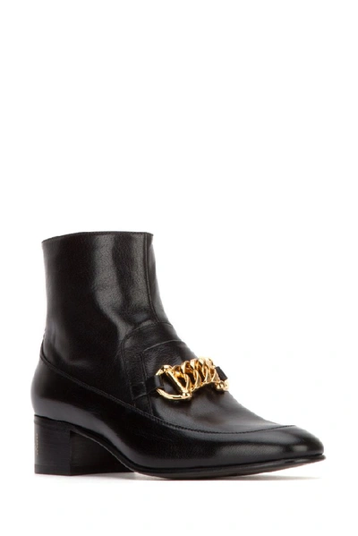 Shop Gucci Horsebit Chain Ankle Boots In Black