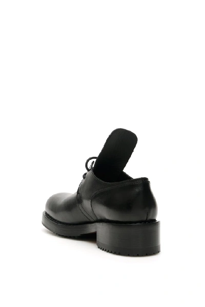 Shop Raf Simons Text Embossed Derby Shoes In Black