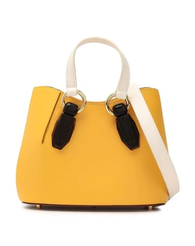 Shop Aevha London Handbag In Yellow