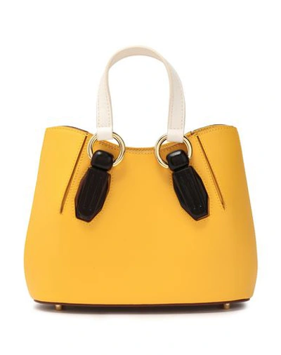 Shop Aevha London Handbag In Yellow