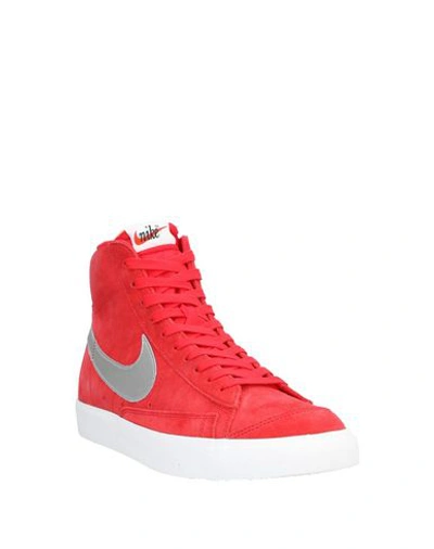 Shop Nike Slippers In Red