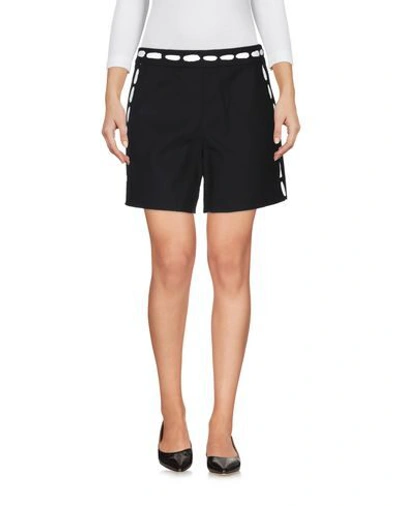 Shop Moschino Shorts & Bermuda Shorts In Black