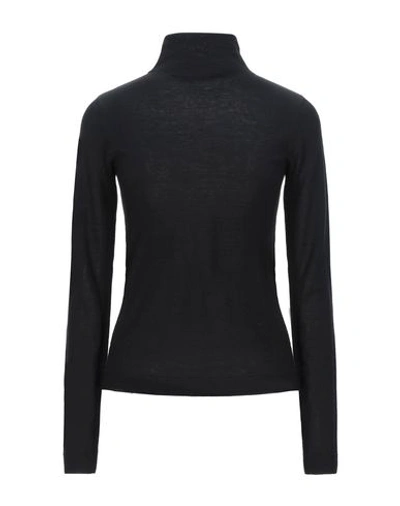 Shop Vince Turtleneck In Black