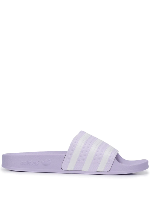 purple adilette slides