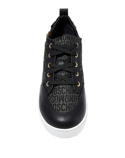 Shop Moschino Sneakers In Black