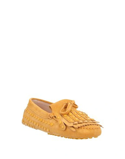 Tod's Fringed Studded Suede Loafers In Yellow