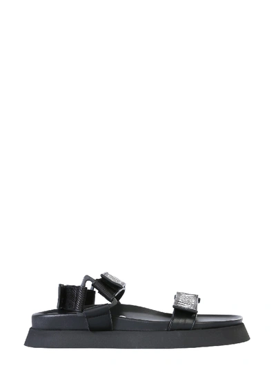 Shop Moschino Sandals With Logo In Nero