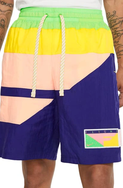 Shop Nike Flight Nylon Athletic Shorts In Regency Purple/bleached Coral
