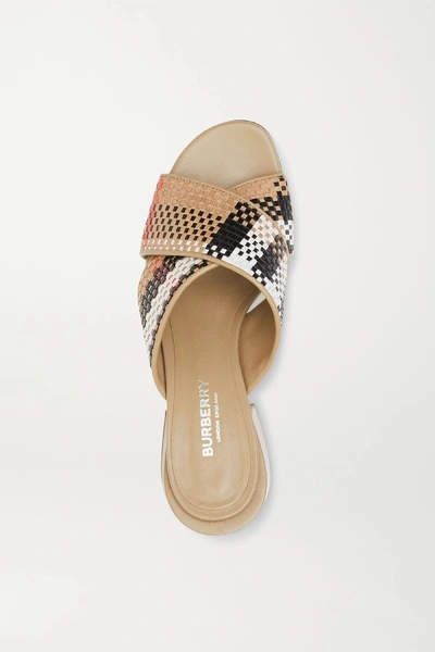 Shop Burberry Woven Leather Mules In Beige