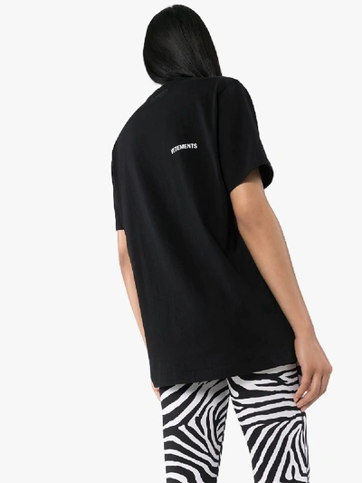 Shop Vetements Logo Print Oversized T-shirt In Black