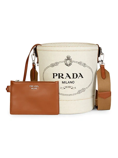 Shop Prada Logo Leather-trim Canvas Bucket Bag In Tan