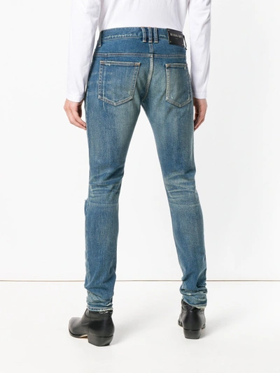 Shop Balmain Distressed Skinny Jeans