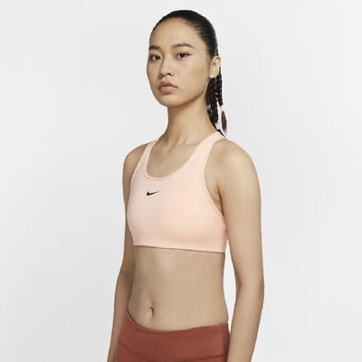 Shop Nike Dri-fit Swoosh Women's Medium-support 1-piece Pad Sports Bra In Washed Coral,black