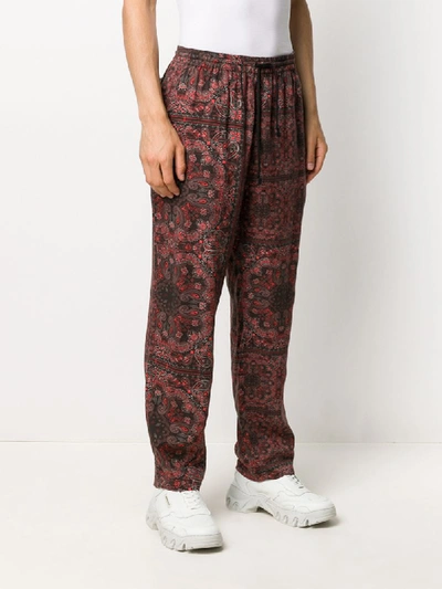 Shop White Mountaineering Bandana-print Trousers In Red