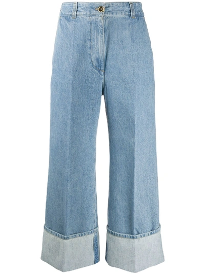 Shop Patou Flared Turn-up Jeans In Blue