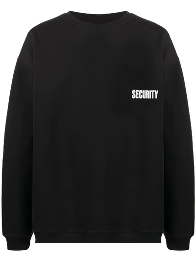 Shop Vetements Security Print Oversized Sweatshirt In Black
