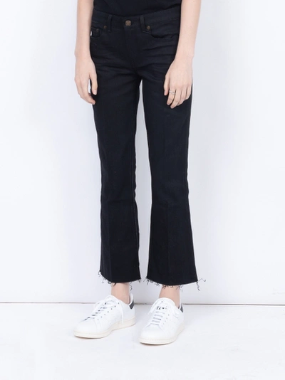 Shop Saint Laurent Cropped Flared Jeans