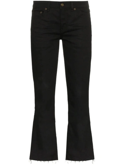 Shop Saint Laurent Cropped Flared Jeans