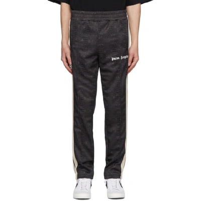 Shop Palm Angels Black Croco Track Pants