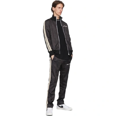 Shop Palm Angels Black Croco Track Pants