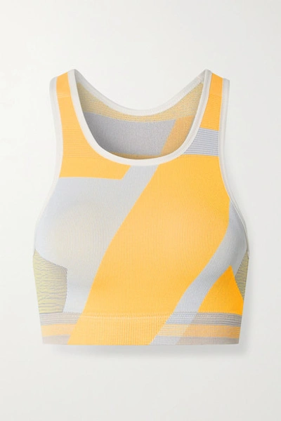 Shop Nike Icon Clash Color-block Dri-fit Stretch-knit Sports Bra In Pastel Orange