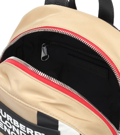 Shop Burberry Nico Icon Stripe Backpack In Beige