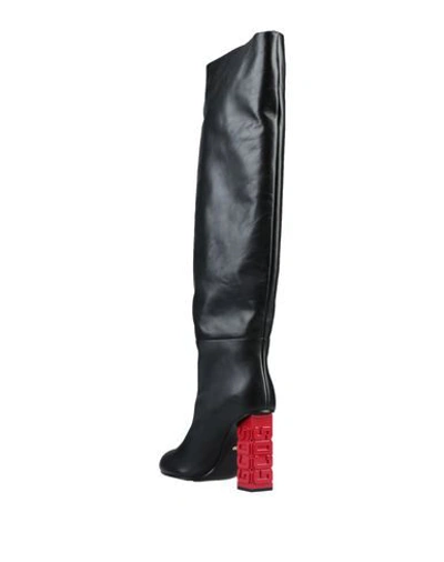 Shop Gcds Boots In Black