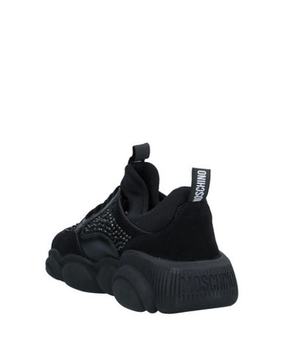 Shop Moschino Sneakers In Black