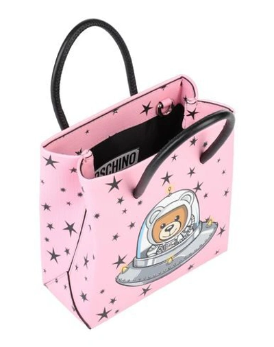 Shop Moschino Handbag In Pink