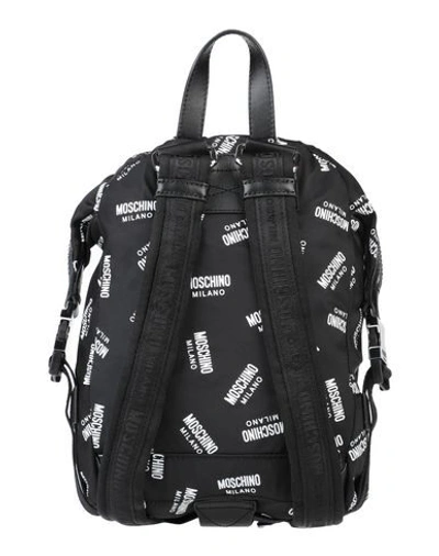 Shop Moschino Backpacks In Black