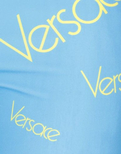 Shop Versace Leggings In Azure