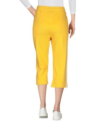 Shop Lala Berlin Cropped Pants & Culottes In Yellow