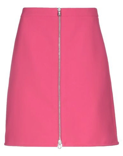 Shop Moschino Midi Skirts In Fuchsia