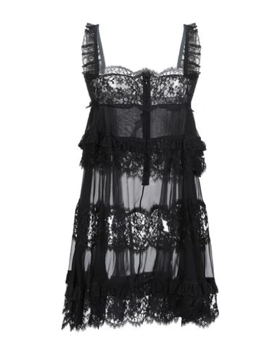 Shop Dolce & Gabbana Slips In Black
