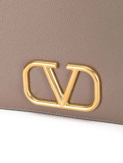 Shop Valentino Vlogo Front-flap Clutch In Brown