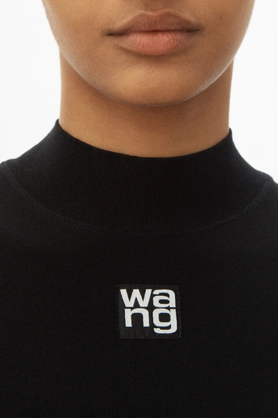 Shop Alexander Wang Logo Patch Mock Neck Top In Bodycon Knit In Black